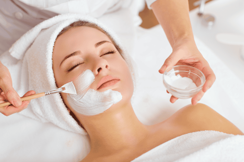 Young woman getting Facial mask | The Natural Aesthetic Medspa in Sykesville, MD